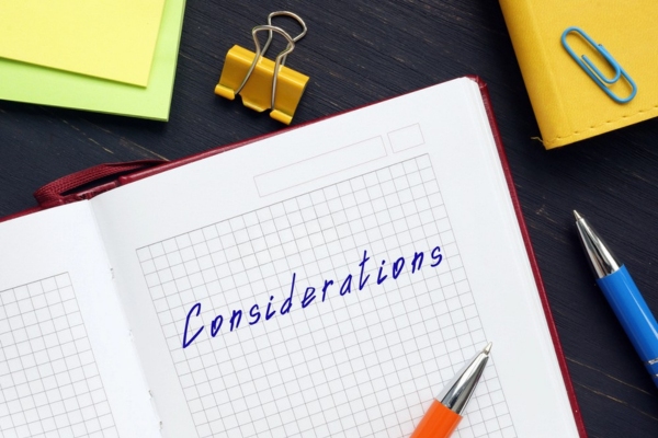 Considerations handwritten on a notebook