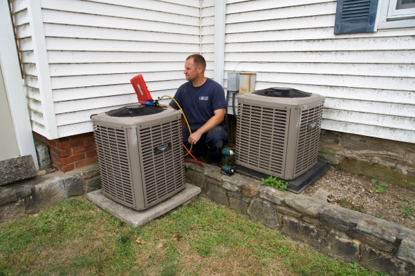 J.J. Sullivan Air Conditioning System service by a professional technician