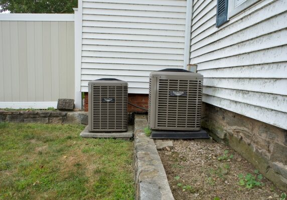 Air Conditioner condensers installed outside the house