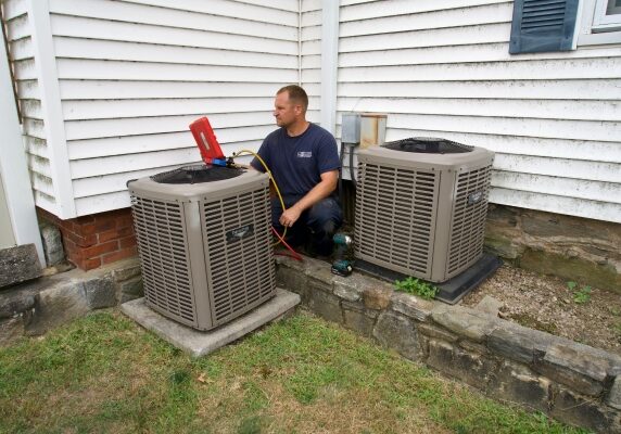 J.J. Sullivan Air Conditioning System service by a professional technician